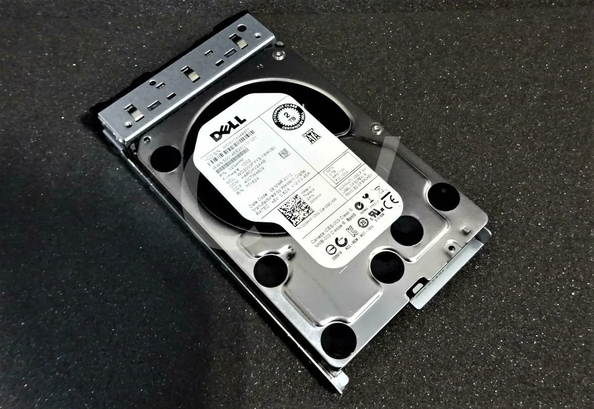 Silver 3.5 inch SATA hard drive with black Dell C-tray bracket