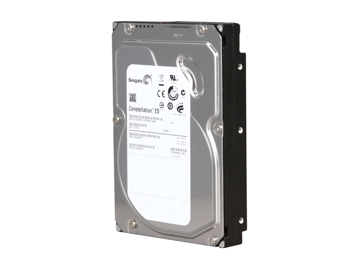 Silver 3.5-inch bare hard drive with circuit board visible underneath