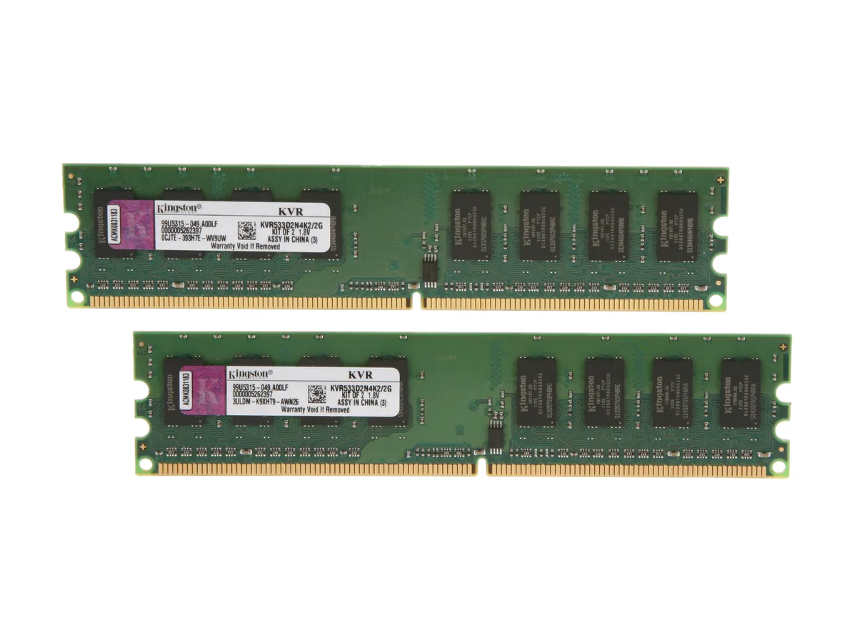Two green circuit boards with black memory chips and gold edge connectors