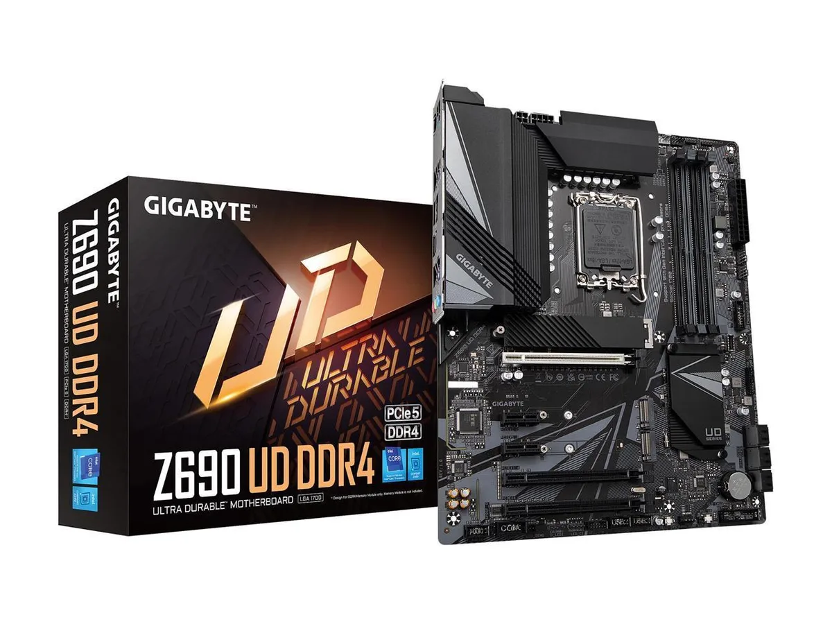 ATX motherboard black PCB silver heatsinks LGA1700 socket four DDR4 slots triple M.2 slots PCIe 5.0 x16 slot 2.5GbE LAN USB 3.2