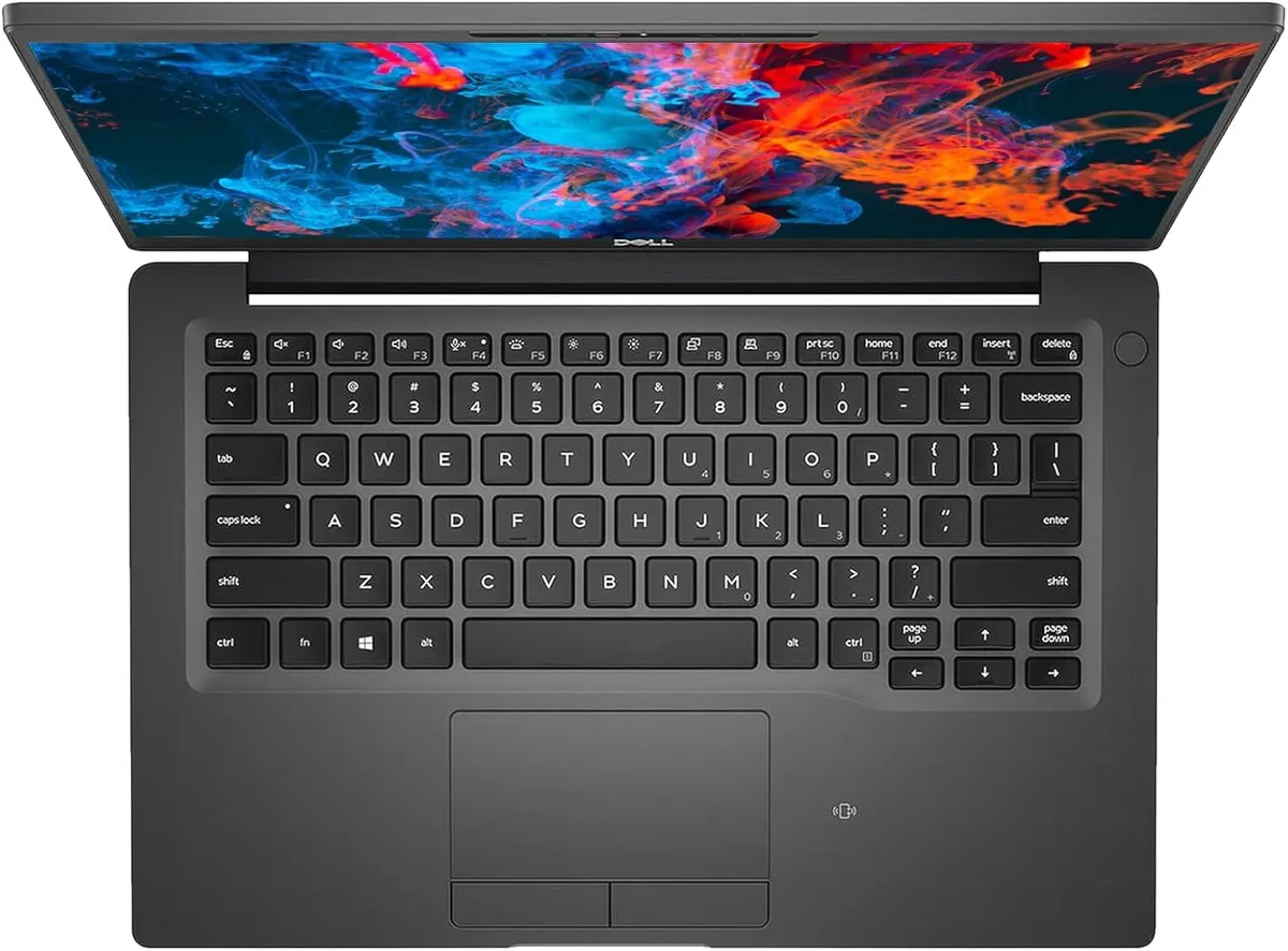 Silver 14-inch business laptop with touchscreen display, backlit keyboard and fingerprint reader