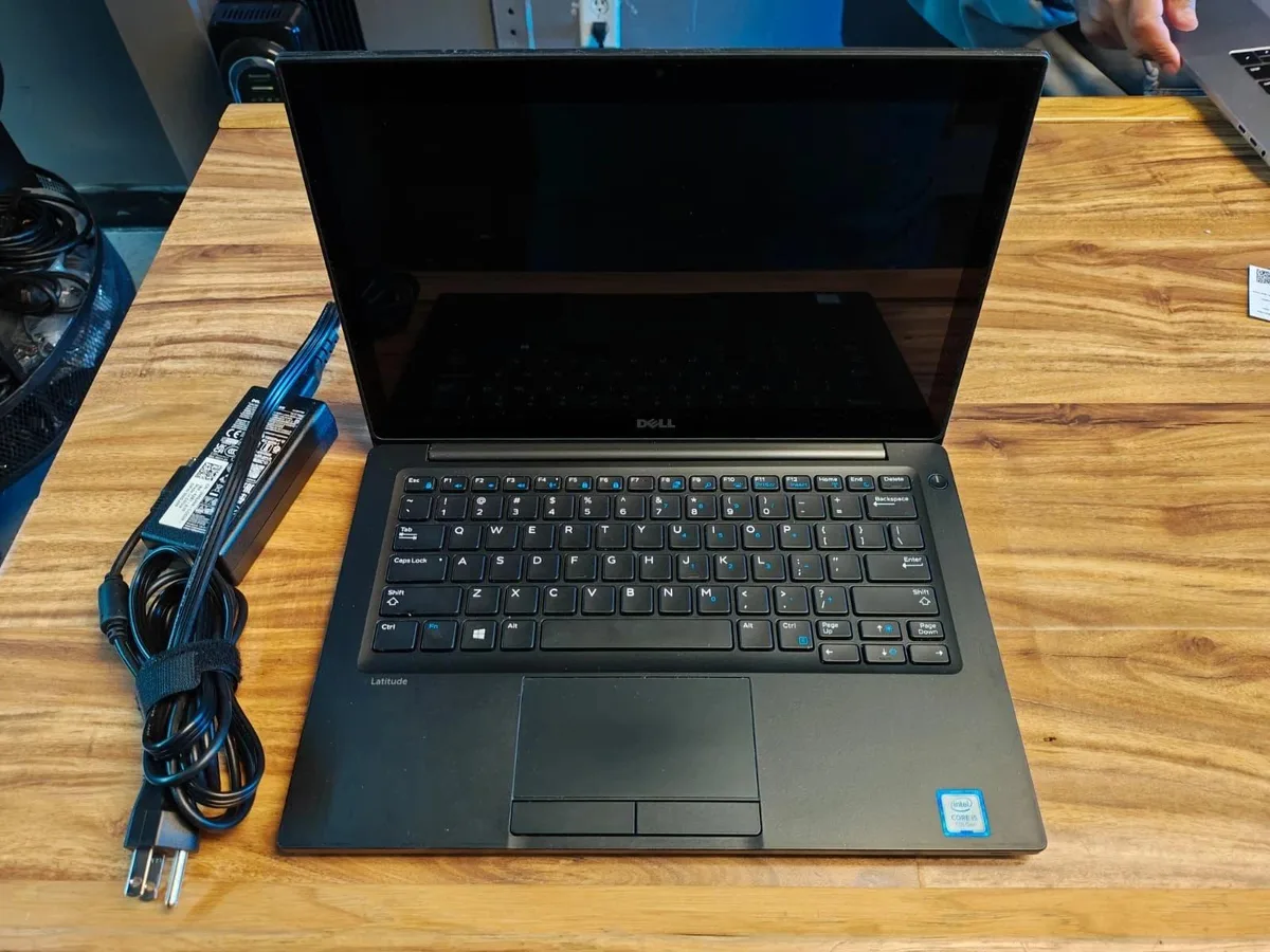 Silver Dell Latitude 7280 12.5 inch touchscreen laptop with keyboard wear