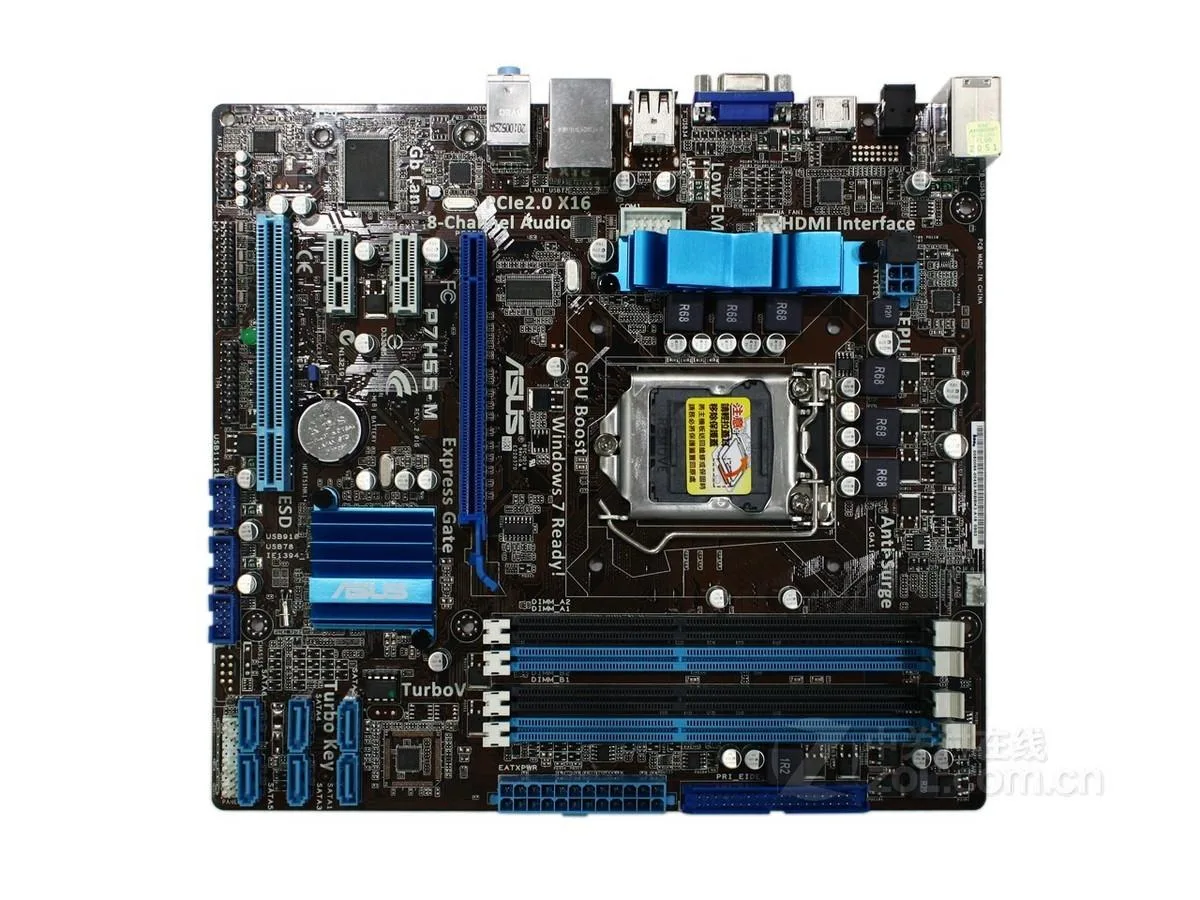 Green micro ATX motherboard with silver CPU socket and black DDR3 slots