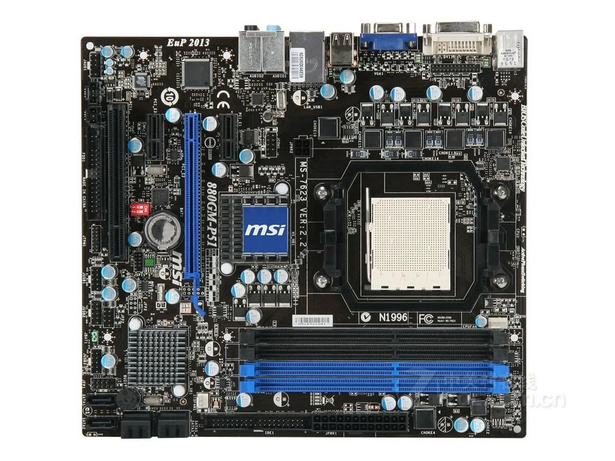 Green Micro ATX motherboard with black slots and silver heatsinks