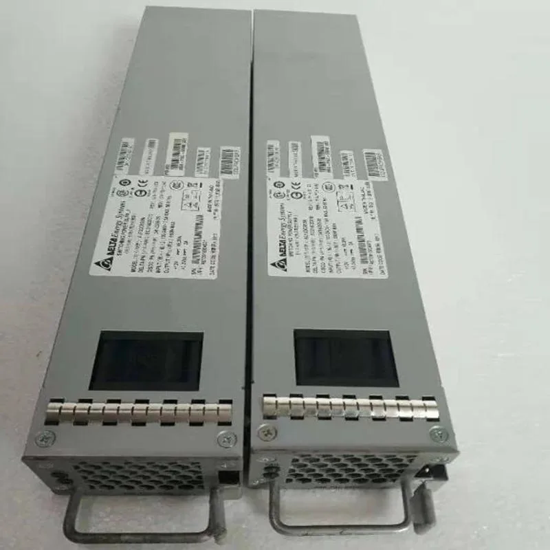 Rectangular silver ATX power supply unit with ventilation grille and power socket visible