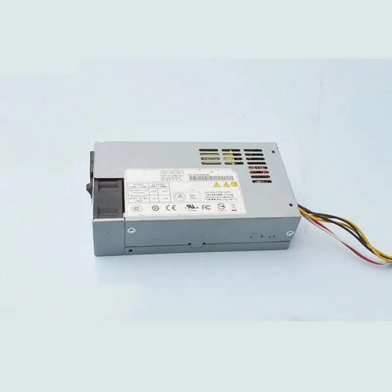 Silver ATX power supply unit with cooling fan and cable bundle