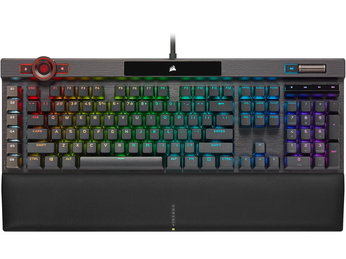 Full-size black mechanical keyboard with detachable magnetic leatherette palm rest and RGB LightEdge accent