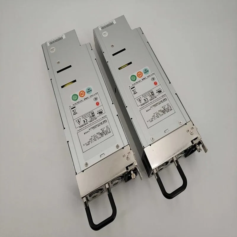 Rectangular black ATX power supply unit with cooling fan grille