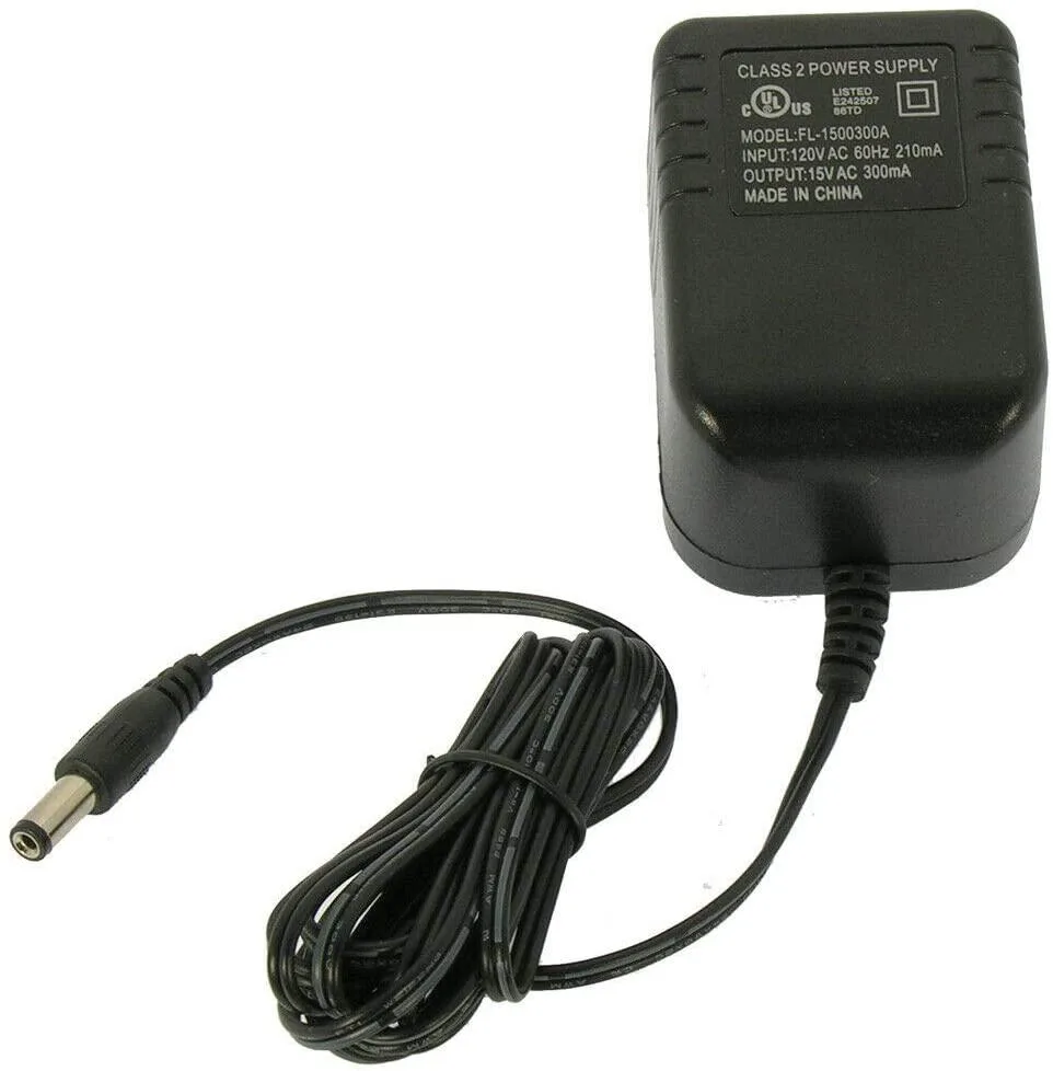Compact black AC power adapter brick with integrated cable