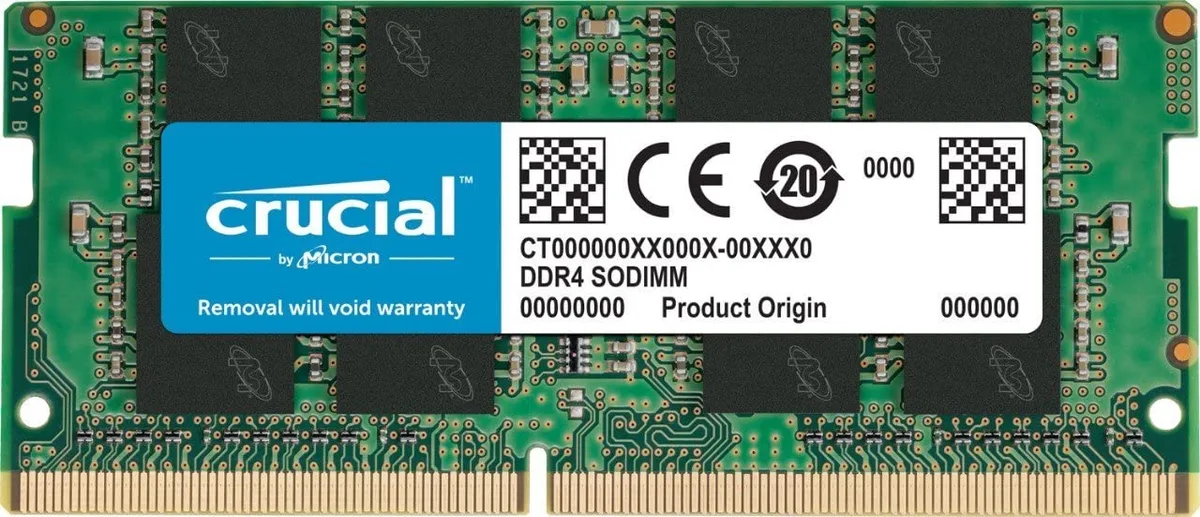 Green rectangular circuit board with black memory chips and gold edge connectors