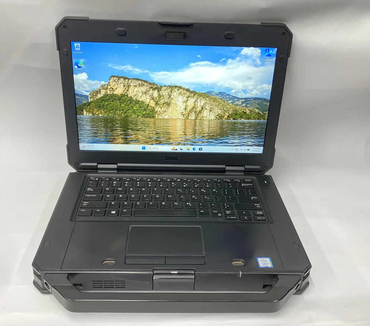 Dell Latitude 5424 laptop, 14 inch matte screen, dark grey chassis with visible wear