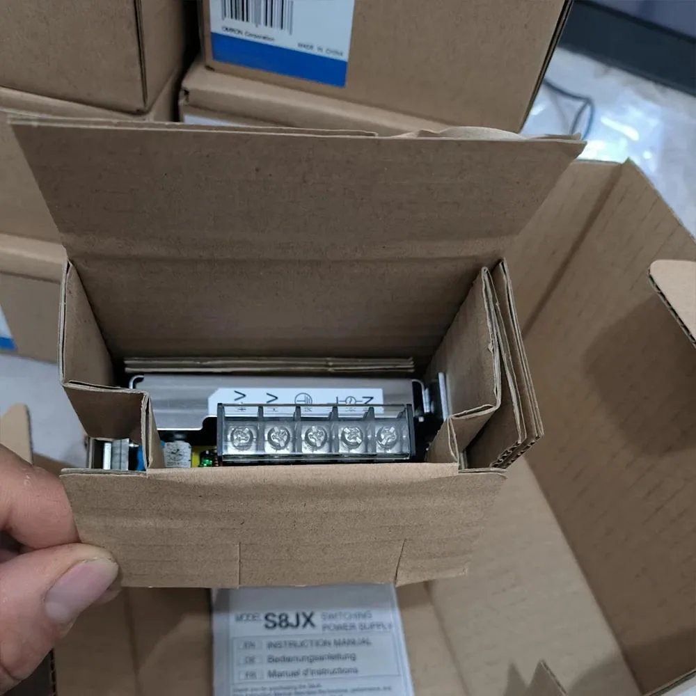 Rectangular DIN-rail power supply in grey metal housing