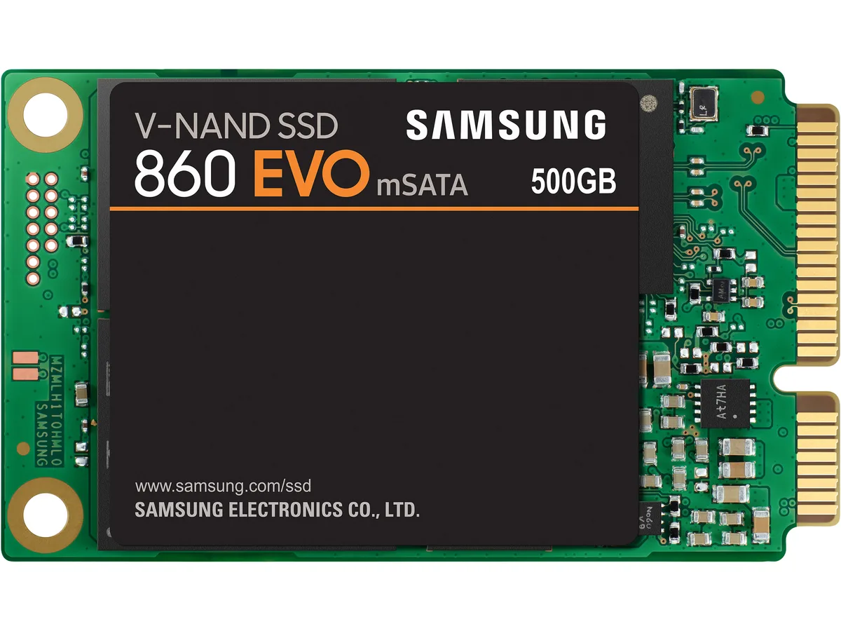 Small rectangular mSATA SSD with green circuit board and black label