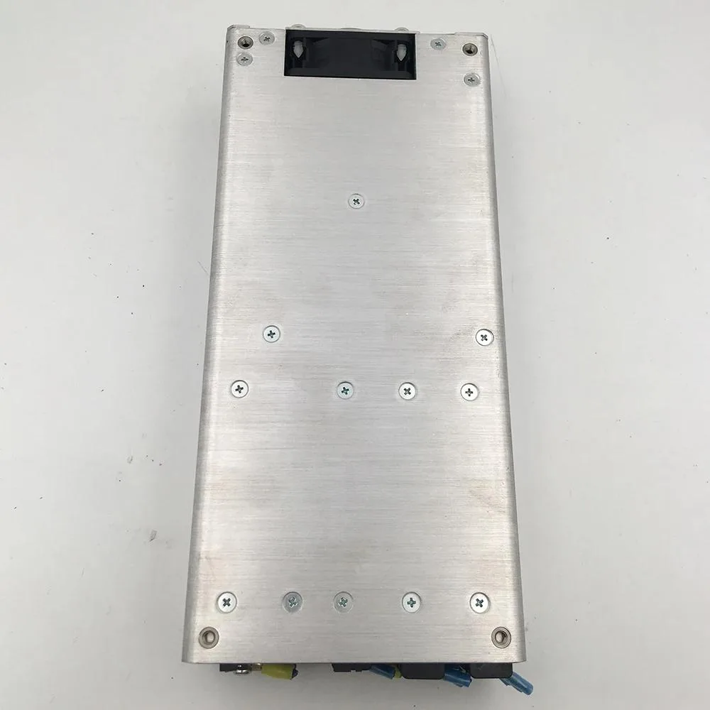 Silver ATX power supply unit with fan grille and cable bundle