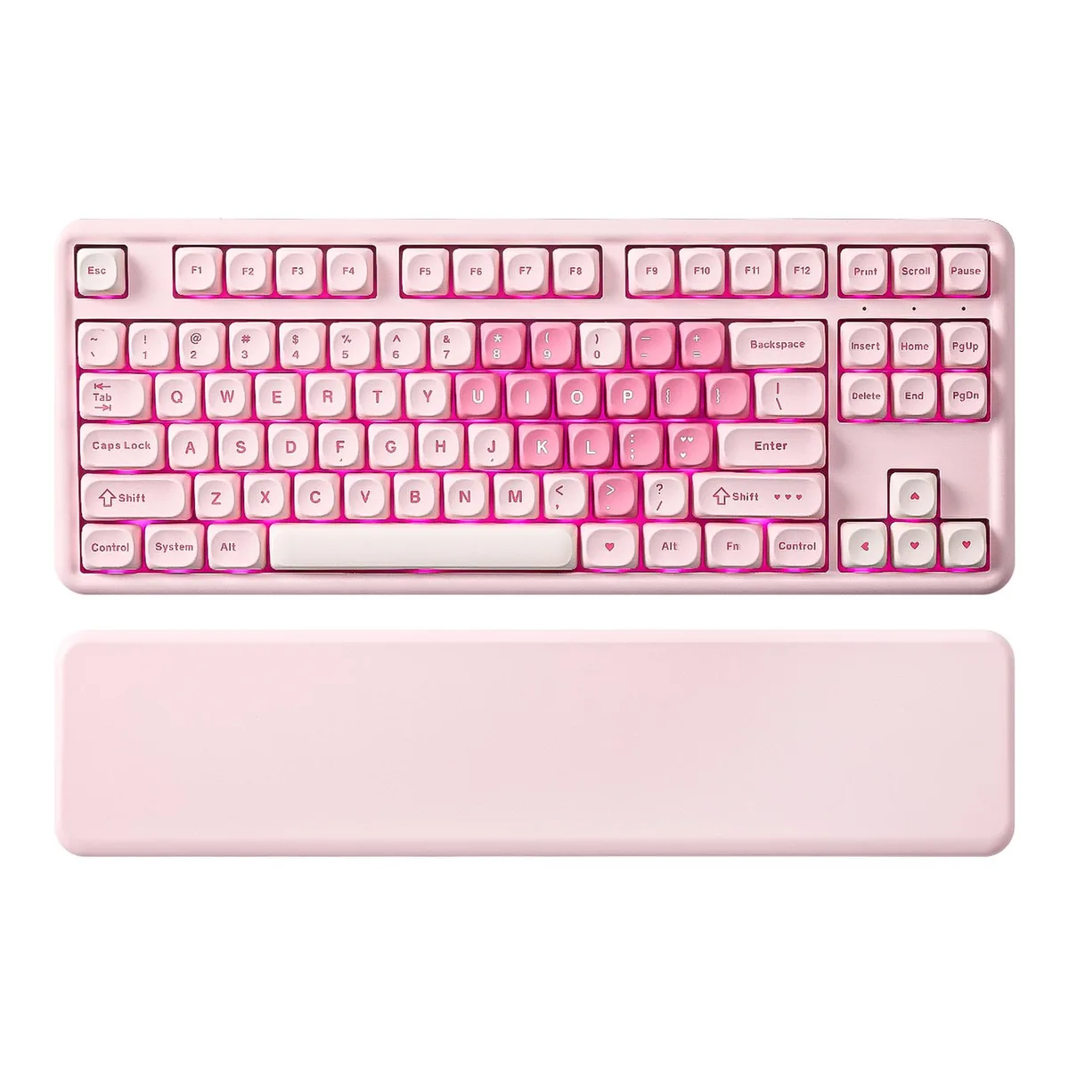 Pink tenkeyless mechanical keyboard with heart-patterned keycaps and matching wrist rest