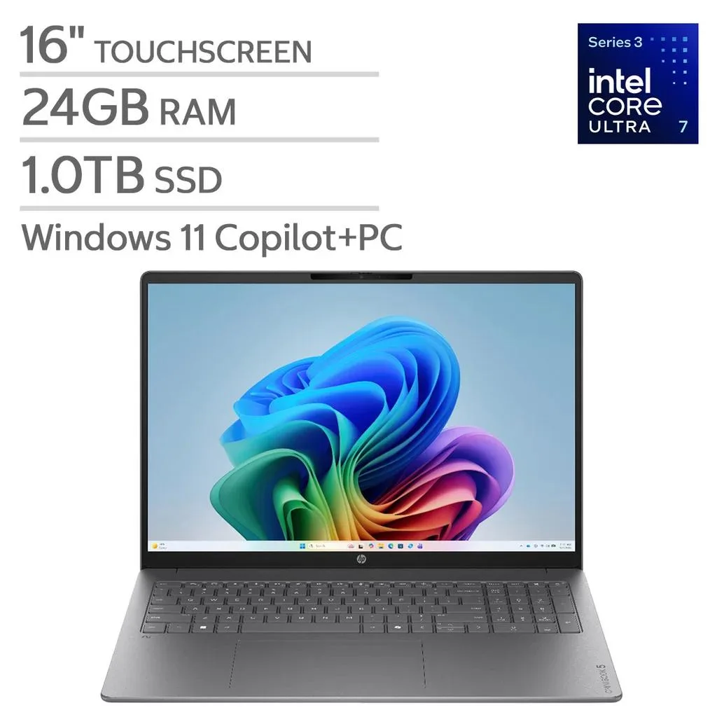 Silver 16-inch touchscreen laptop, thin profile, backlit keyboard with number pad