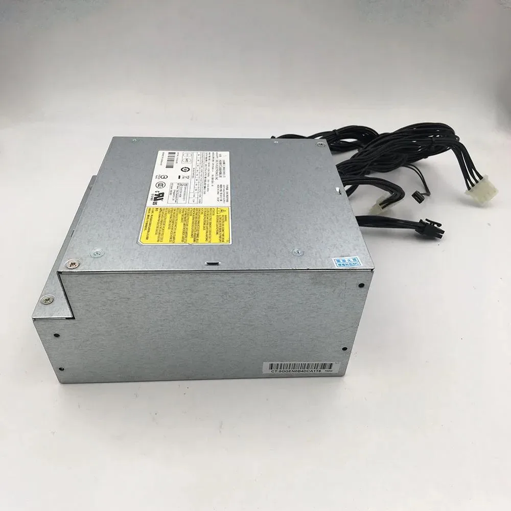 Rectangular silver ATX power supply unit with ventilation grille and label showing 700W rating