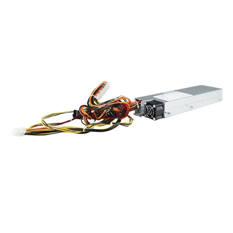 Rectangular metal power supply unit with ventilation grille and label sticker