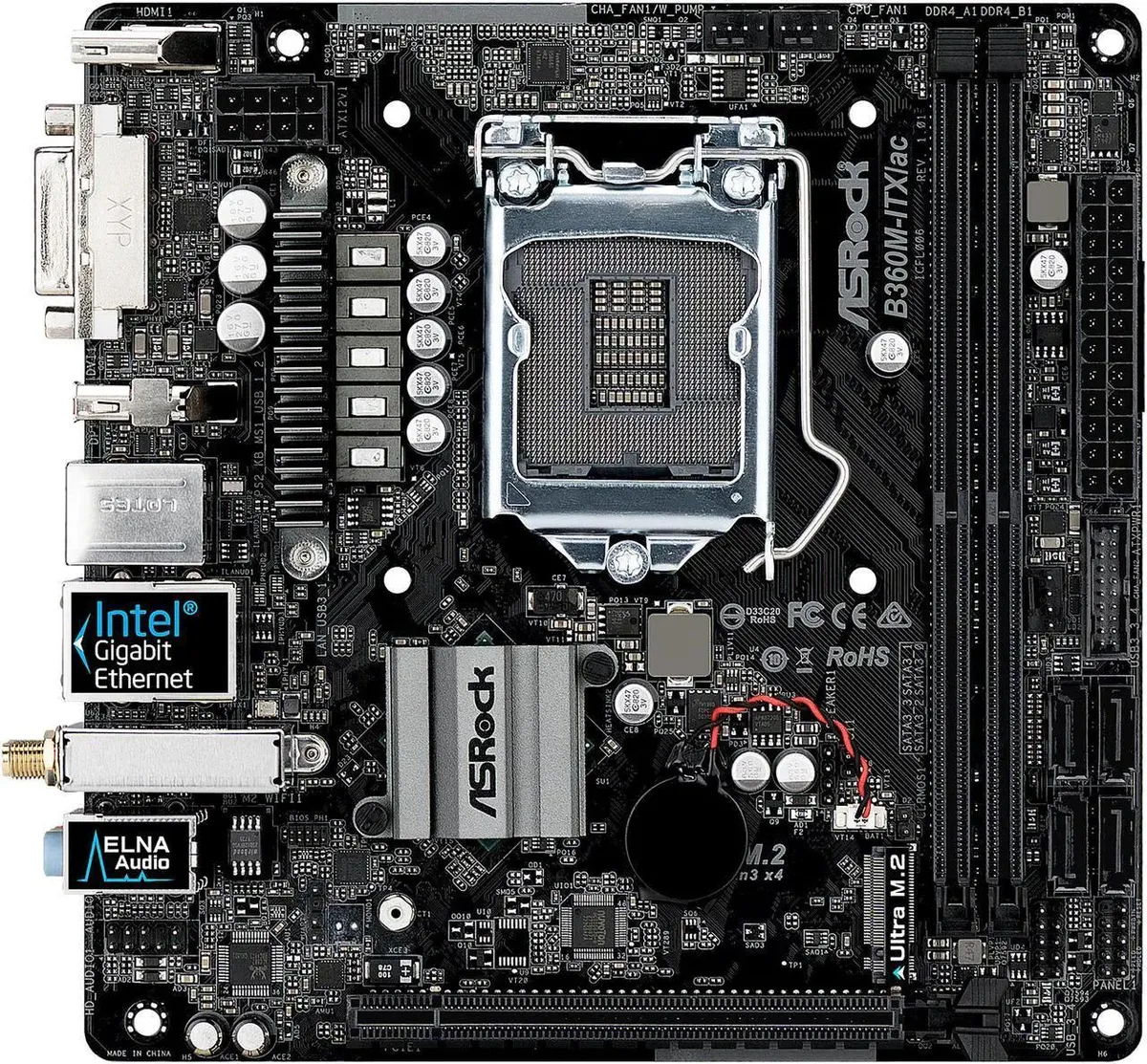 Green rectangular Mini-ITX board with silver CPU socket, two black memory slots, vertical M.2 slot and rear I/O shield