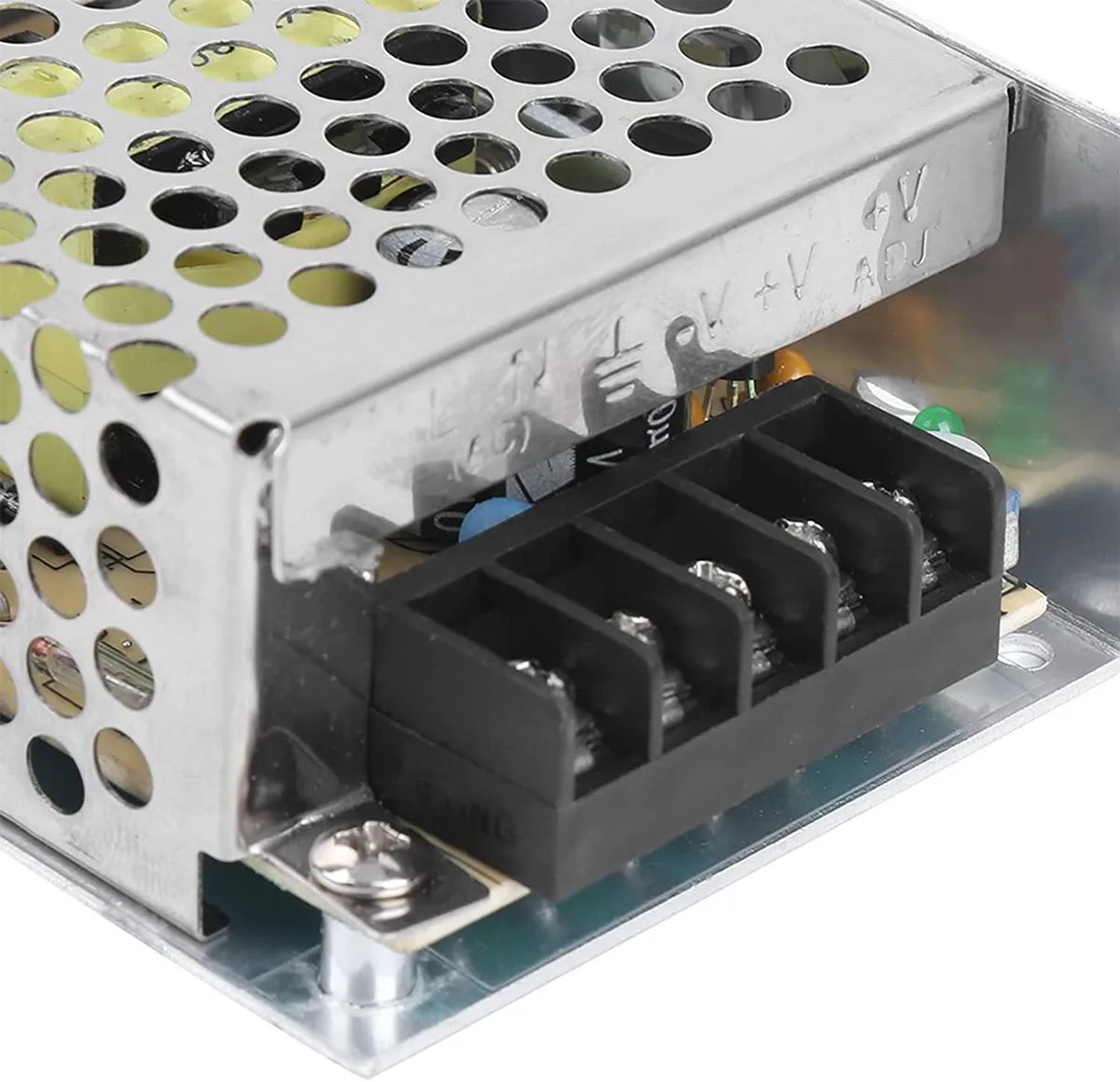 Rectangular silver aluminium power supply, screw terminals visible, 85 by 58 by 33 millimetres