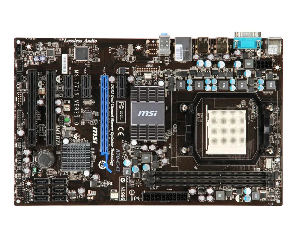Green ATX motherboard with black sockets and silver heatsinks