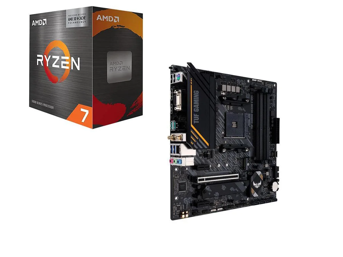 Micro ATX motherboard with dark heatsinks and CPU cooler beside it
