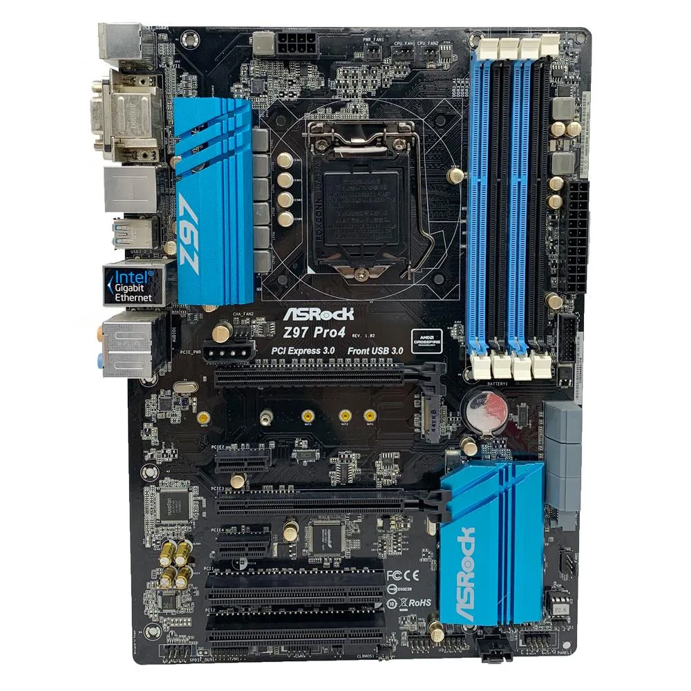 Rectangular ATX board with black PCB, silver heatsinks, blue memory slots, and rear I/O panel