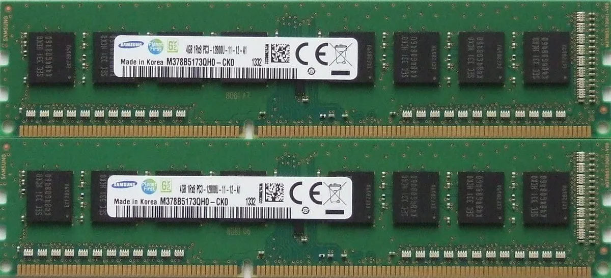 Two green Samsung DDR3 DIMMs with gold contacts