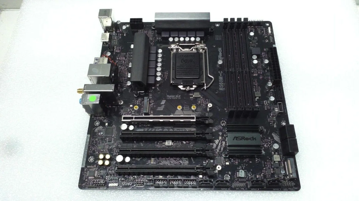 ASRock B560M-C MicroATX motherboard in anti-static bag, plain box, no accessories