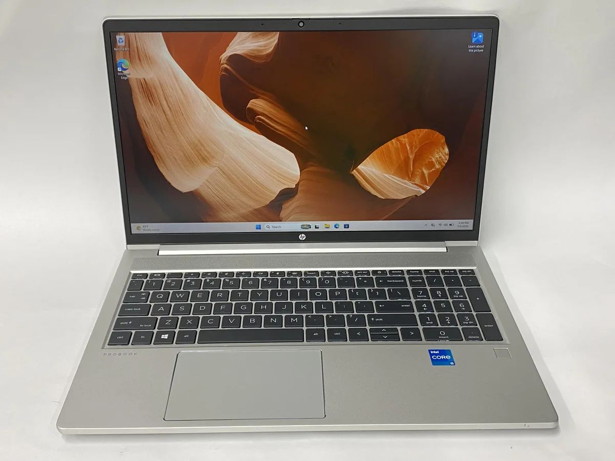 Silver HP ProBook 450 G8 laptop closed on desk