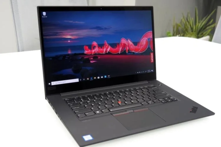 Black Lenovo ThinkPad X1 Carbon 14 inch laptop closed on white background