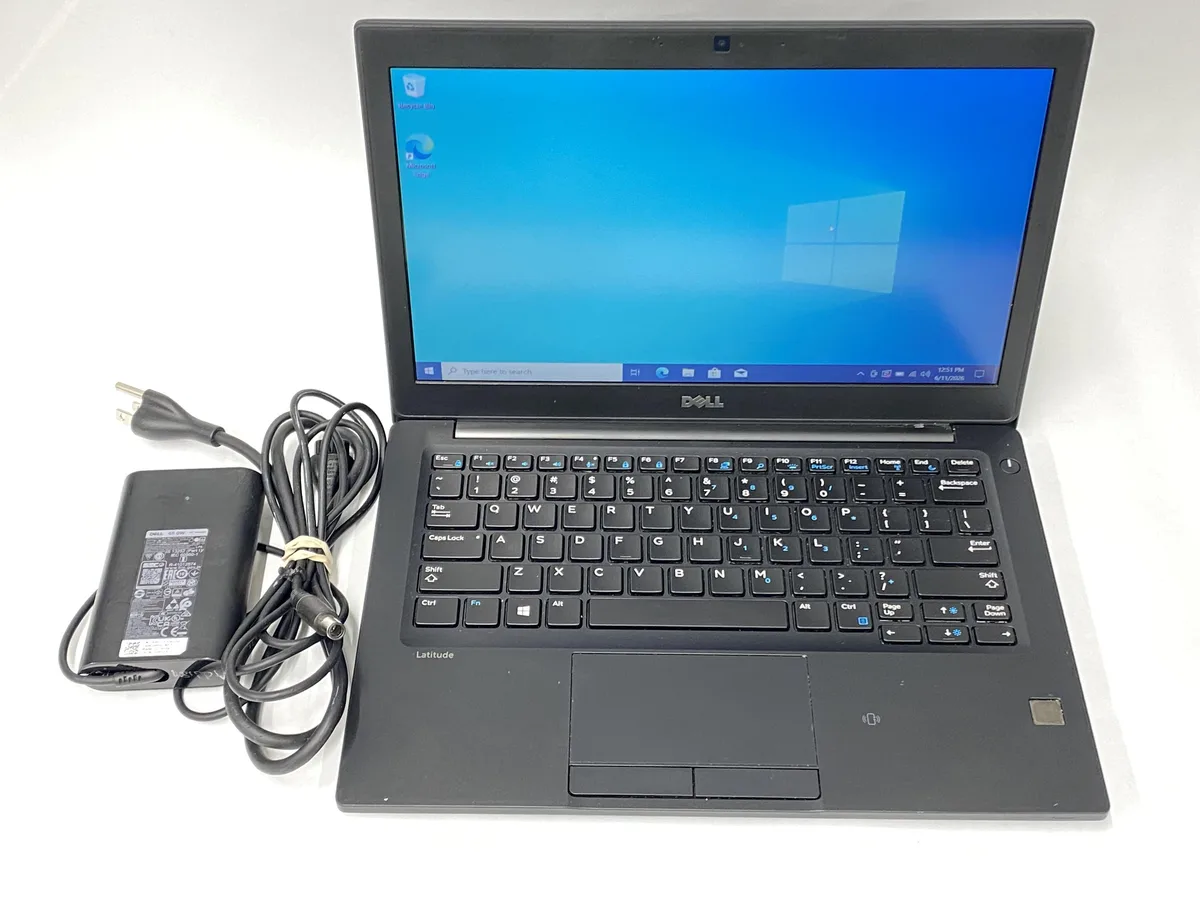 Dell Latitude 7280 12 inch non-touch laptop in dark finish with charger
