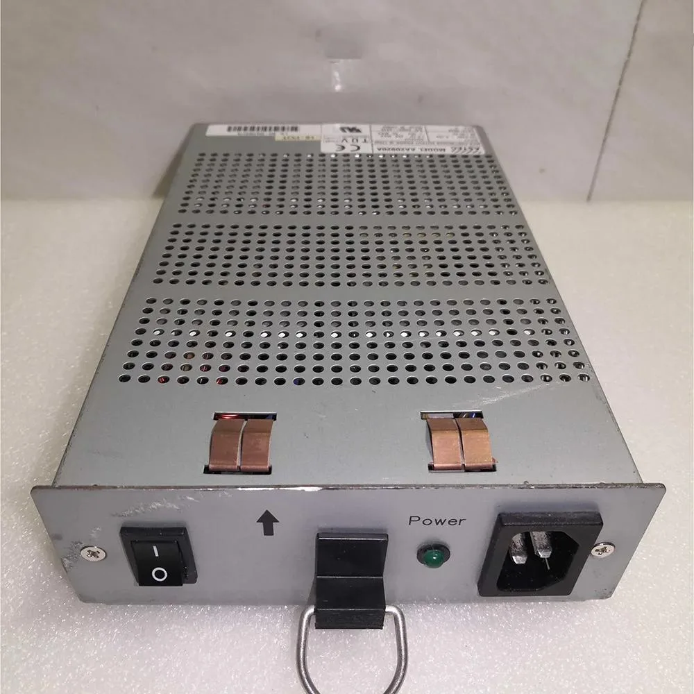Rectangular ATX power supply unit in metal casing with rear fan grille and side label