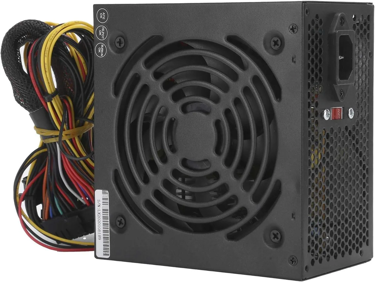 Rectangular silver AT power supply unit with rear fan grille and side voltage switch