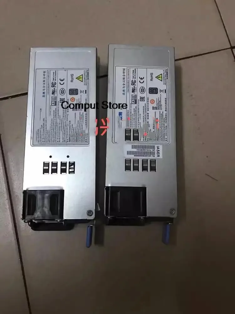 Rectangular silver ATX power supply unit with ventilation grille