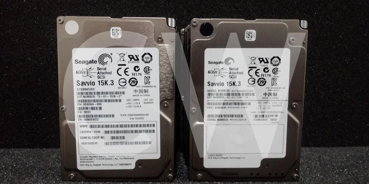 Ten silver 2.5 inch SAS hard drives in anti-static bags