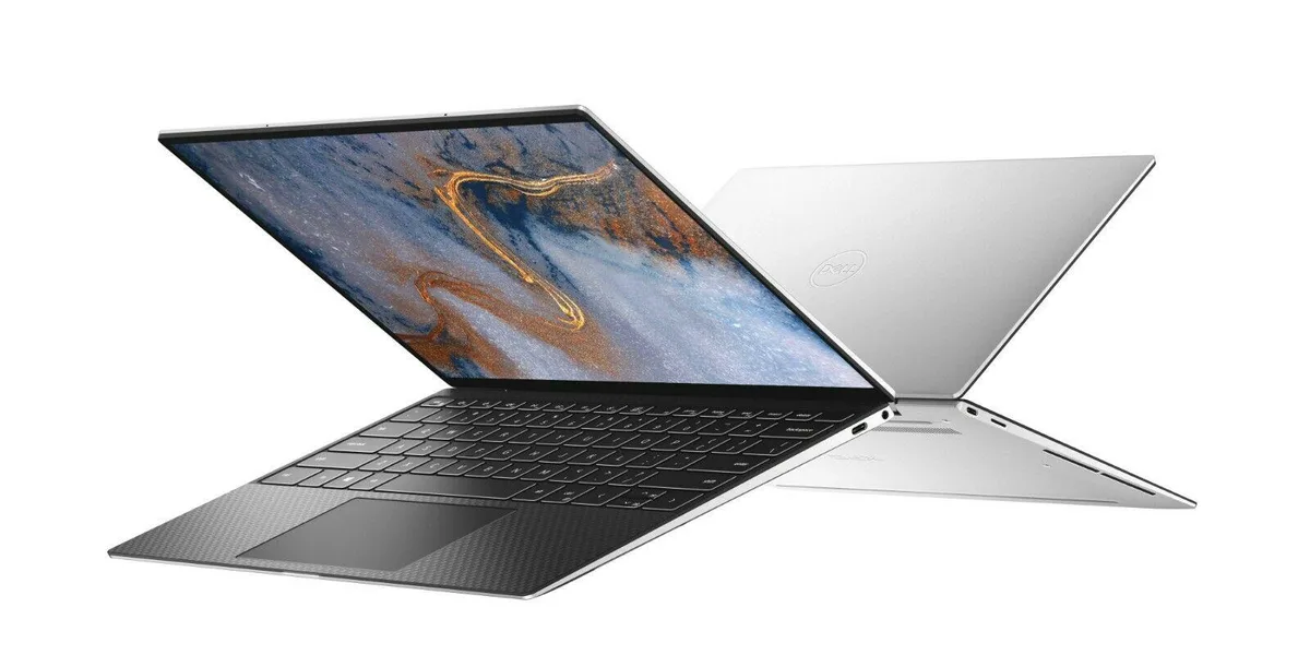 Silver Dell XPS 13 9300 laptop with 13.4 inch UHD+ touchscreen and black carbon fibre palmrest