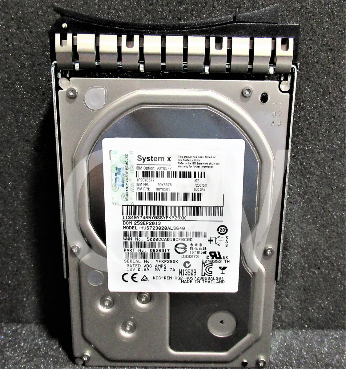 Silver 3.5 inch SAS hard drive in black IBM caddy tray