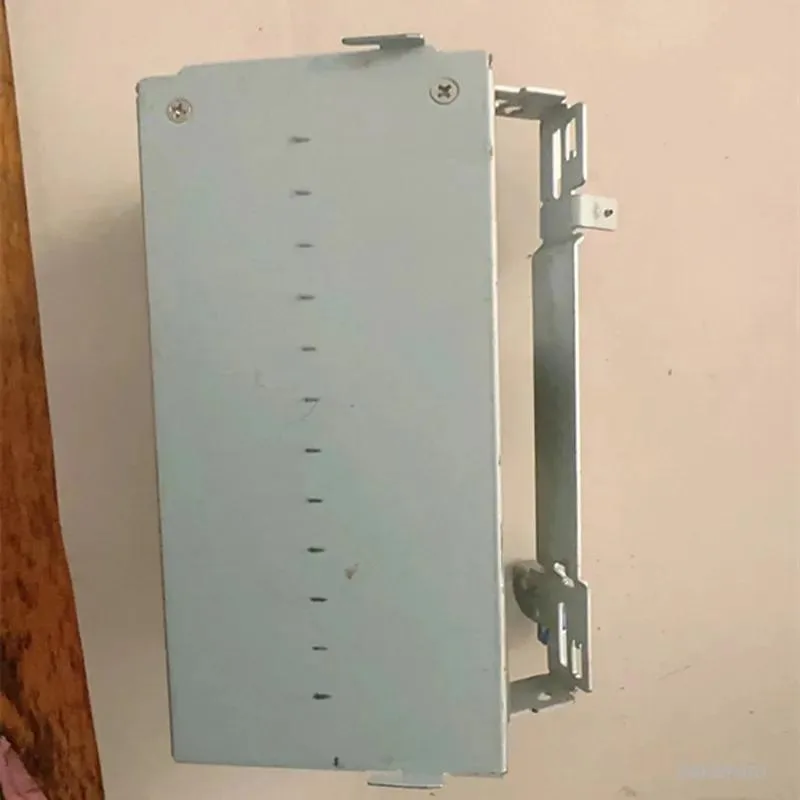Rectangular ATX power supply unit with matte black metal casing and rear fan grille