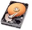 Silver 3.5 inch bare SATA hard drive with exposed circuit board