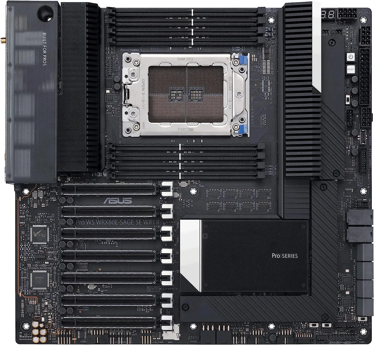 Large rectangular extended ATX motherboard with silver heatsinks and black PCB