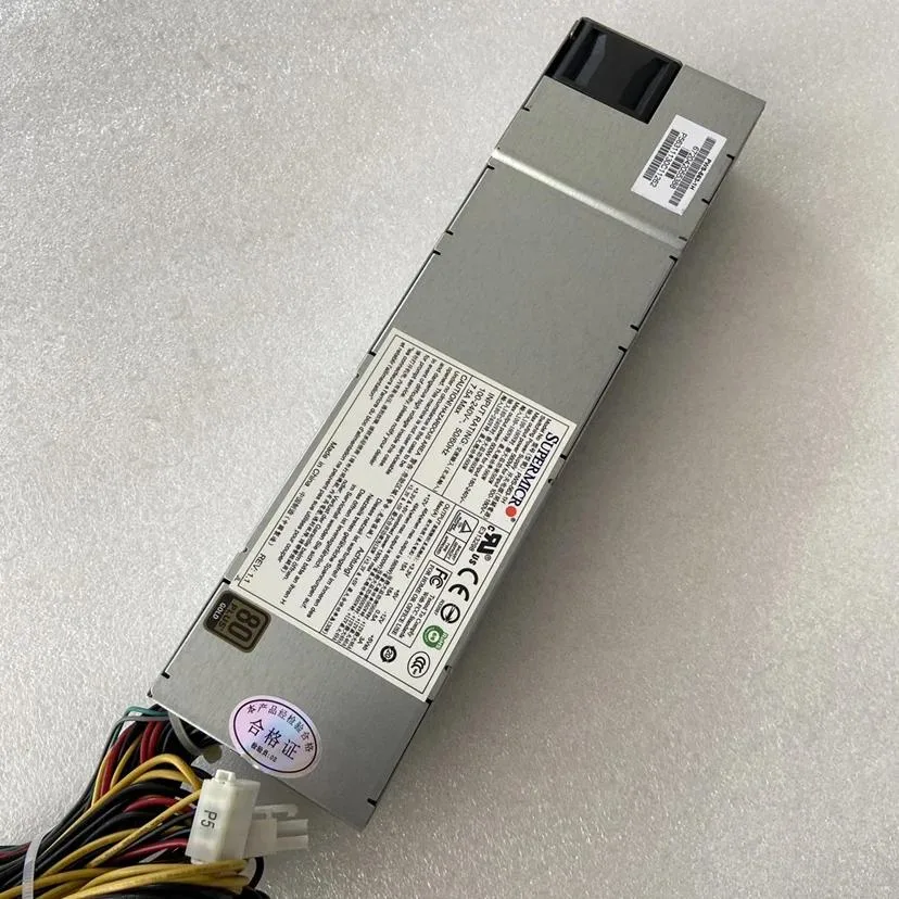 Silver 1U power supply unit with front grille and rear connector panel