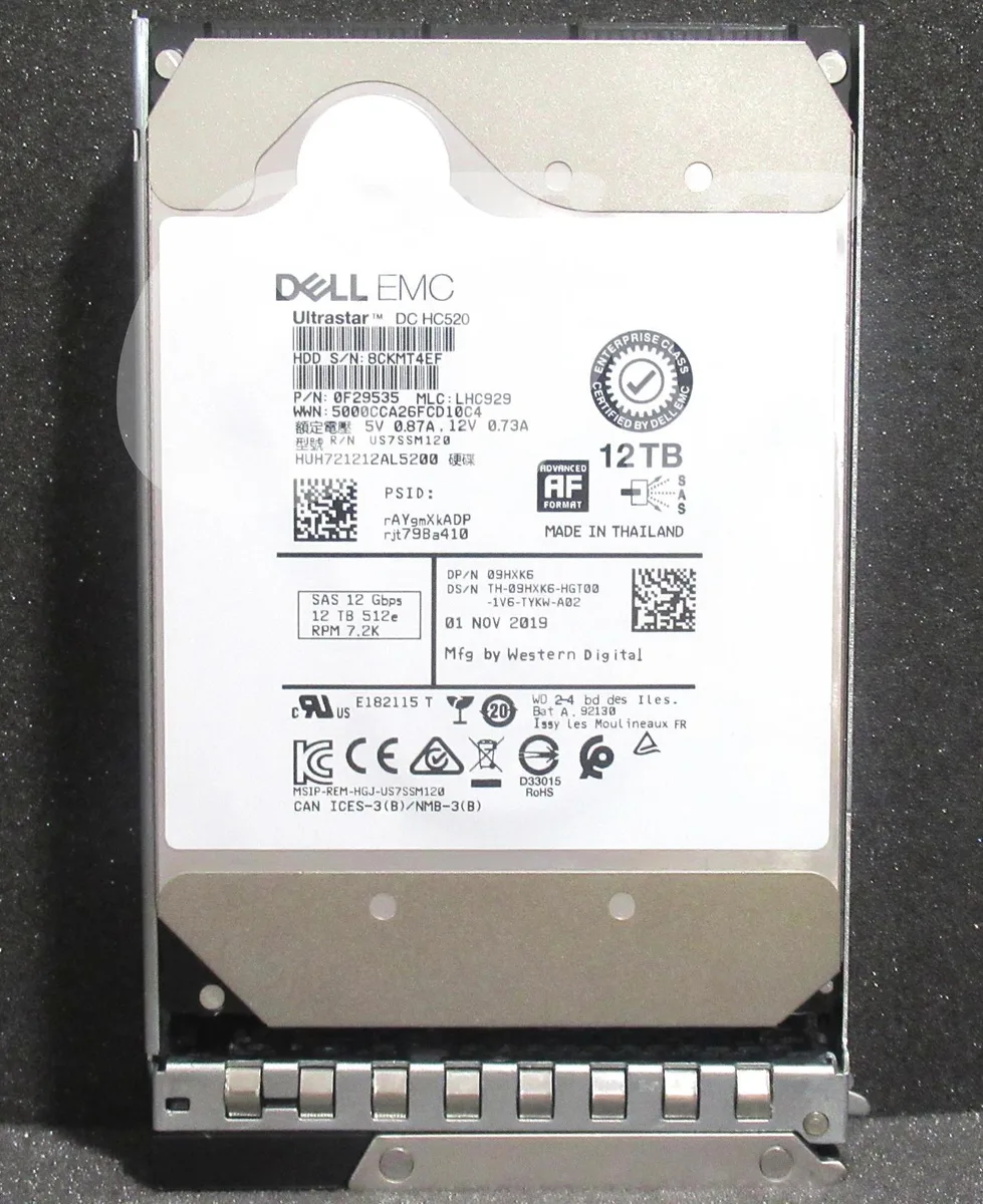 Silver 3.5 inch hard drive with green circuit board and SAS connector