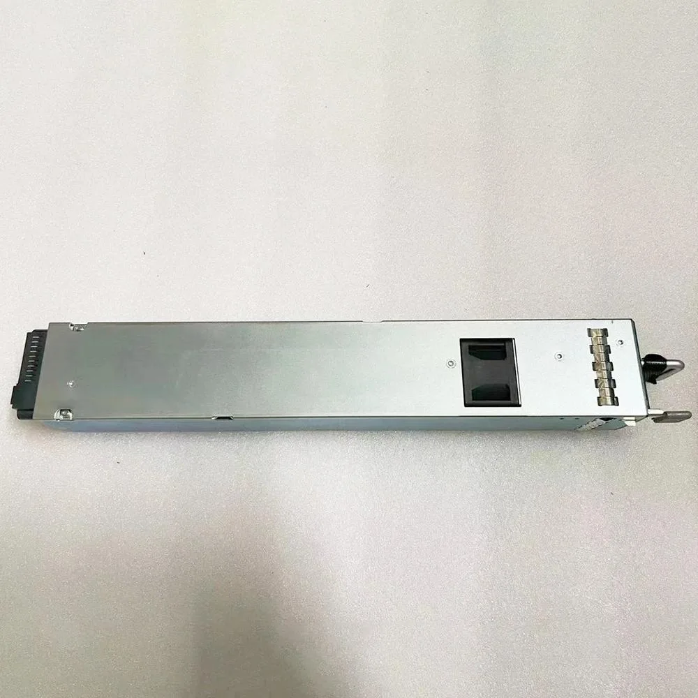 Rectangular silver ATX power supply unit with fan grille and power connector visible