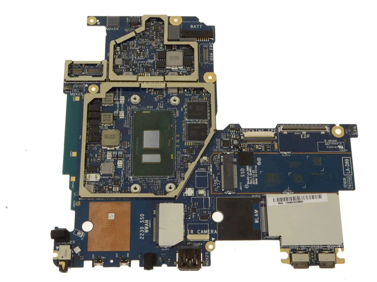 Green rectangular circuit board with silver processor socket and black memory chips