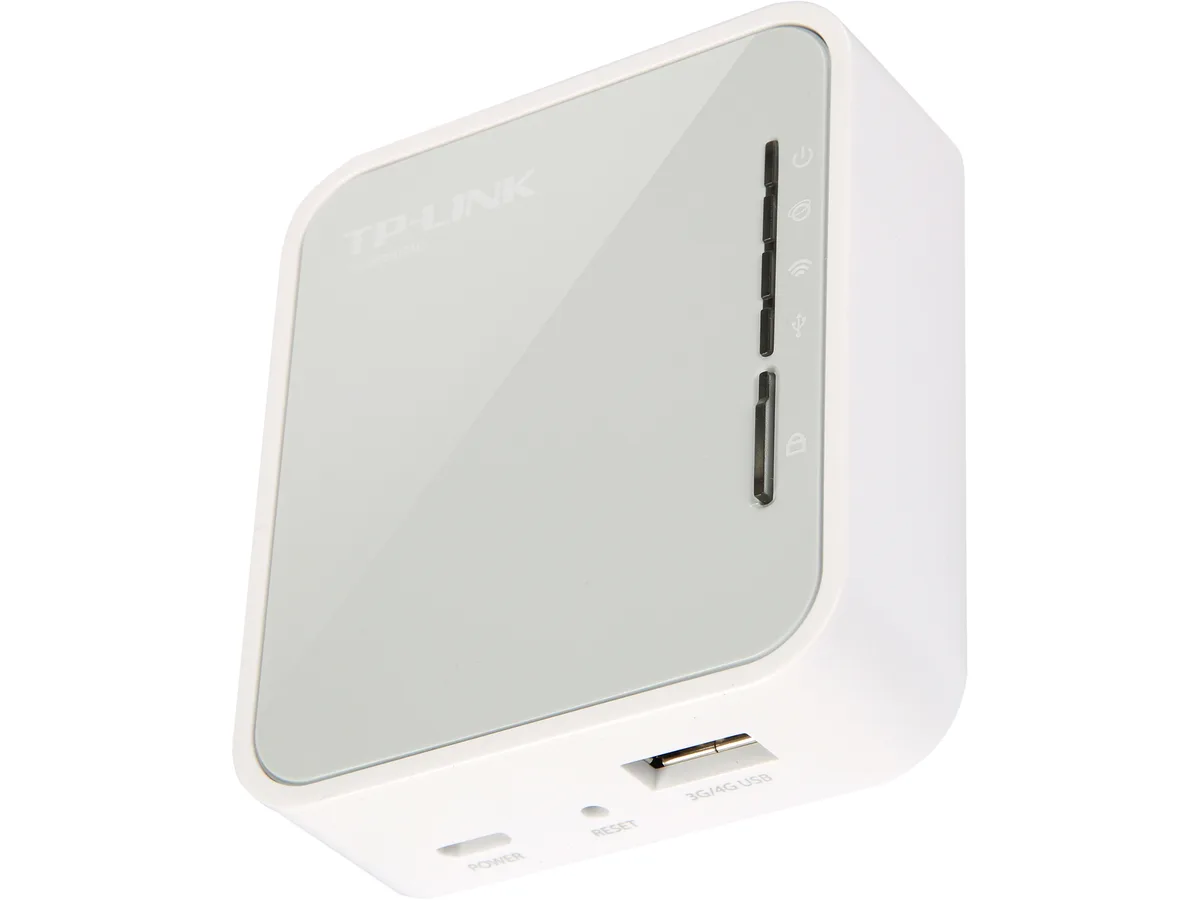 Small white rectangular router with fold-out power prongs, single Ethernet port and micro USB socket
