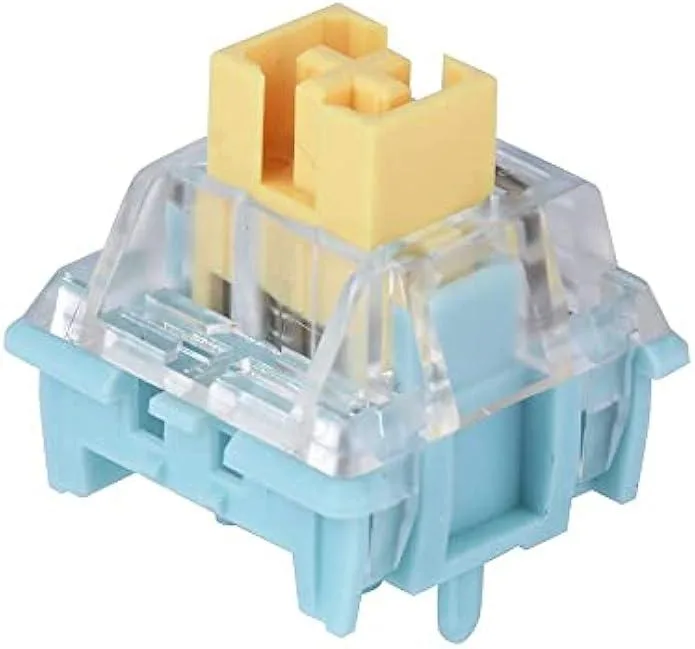 Clear plastic box holding thirty-five linear mechanical switches with translucent housings and LED slots
