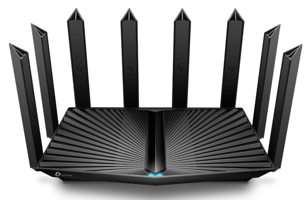 Black rectangular router with eight fixed antennas lying flat on top