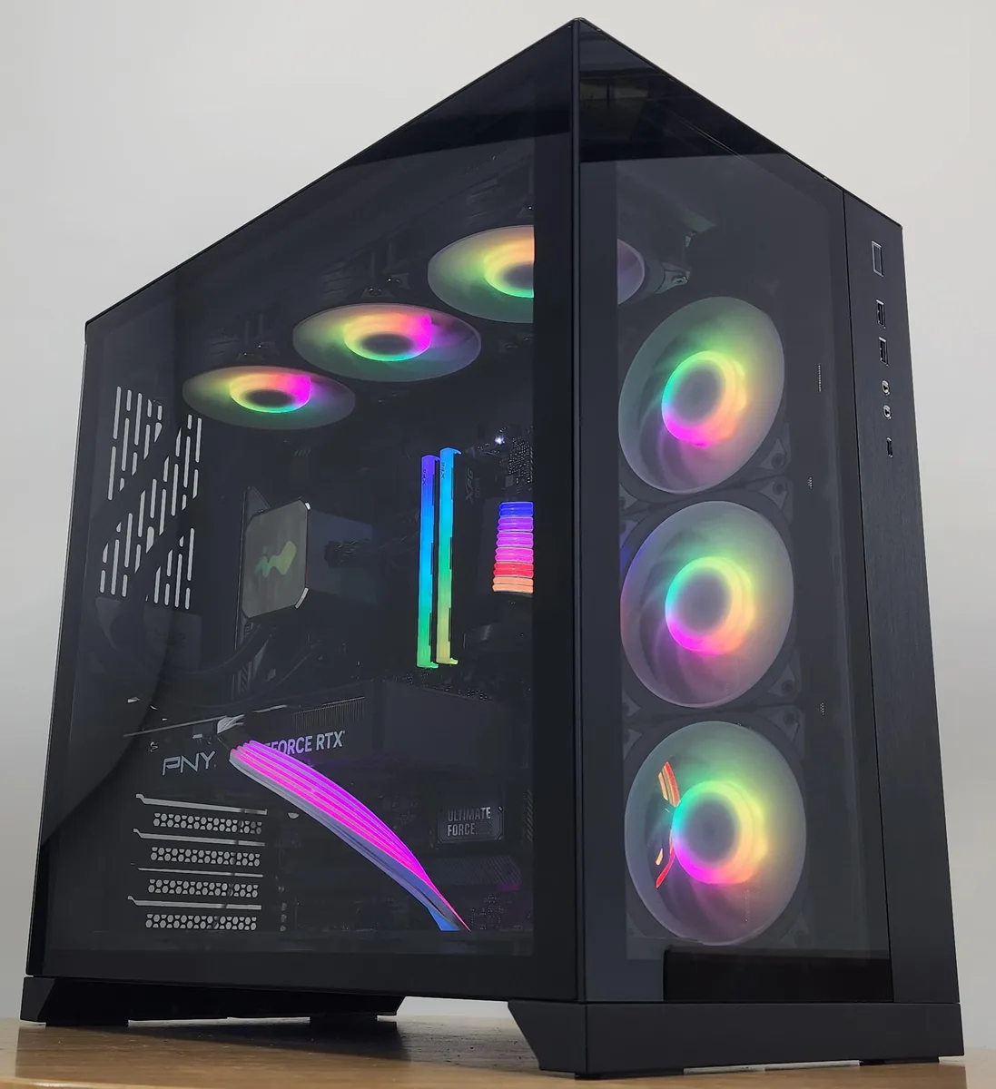 Black Lian Li O11 Dynamic case with 360mm AIO and RTX 4070 visible through glass