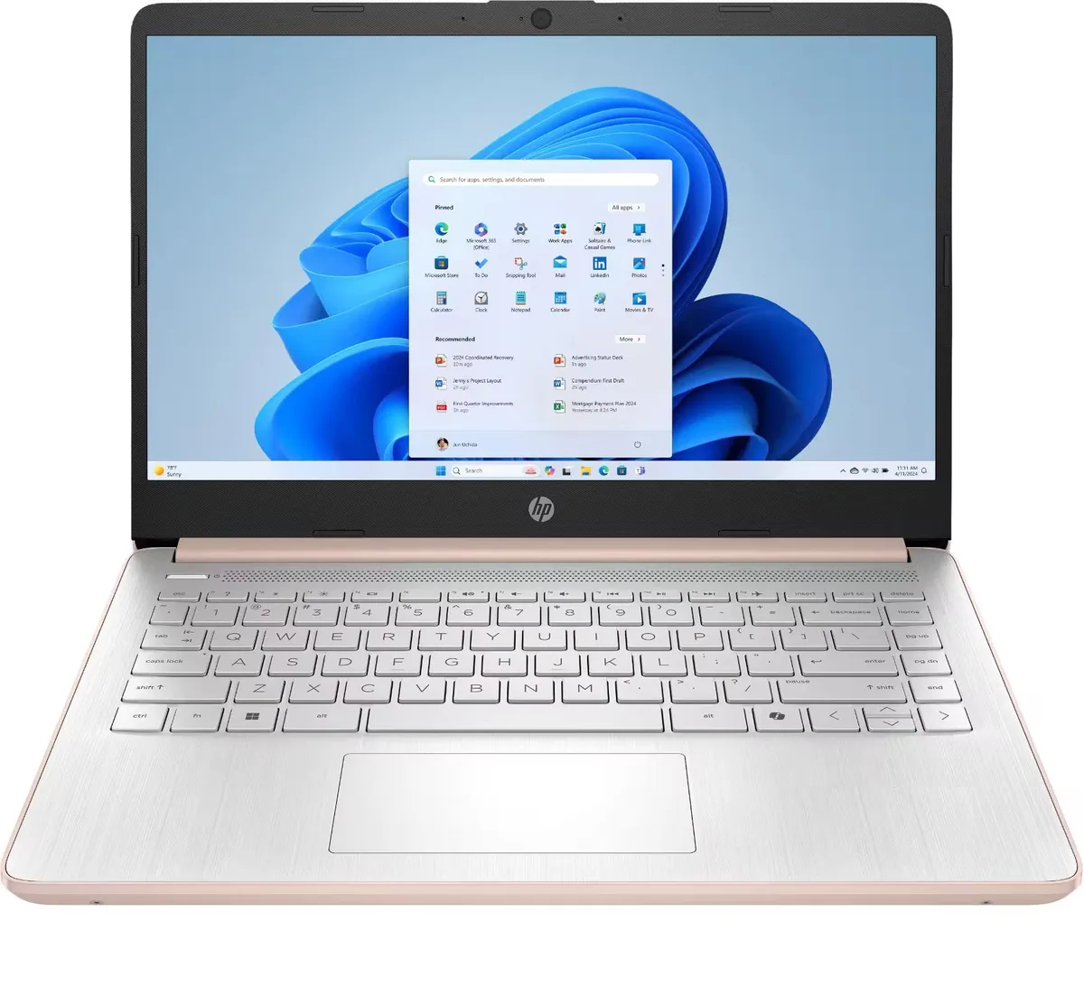 Pink 14 inch HP laptop closed on a light surface